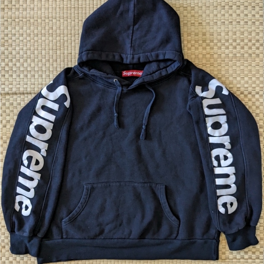 Supreme Dark Blue Hoodie with White Sleeve Logo